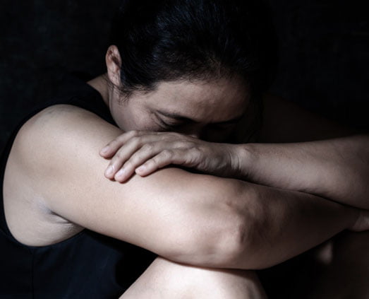 Sad Woman breach of DVO Queensland - Breach of DVO Queensland: Top 5 Mistakes That Lead to Jail Time